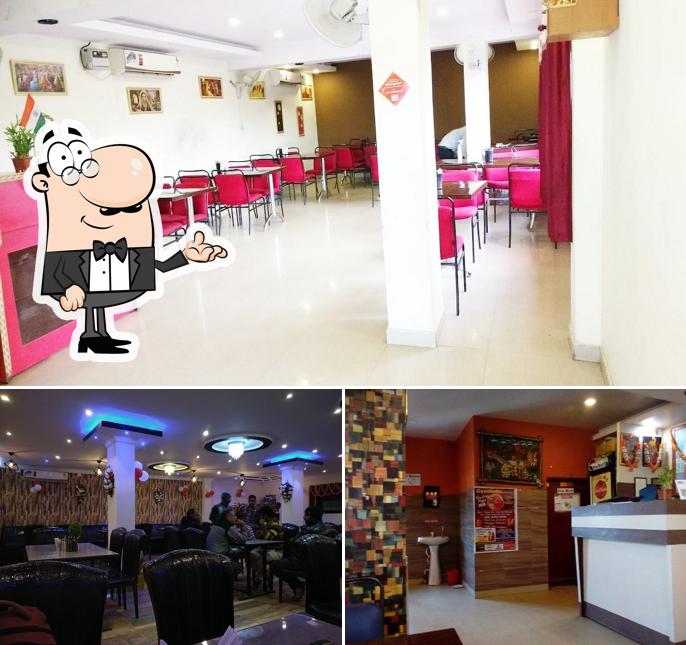Take a seat at one of the tables at The Food Court