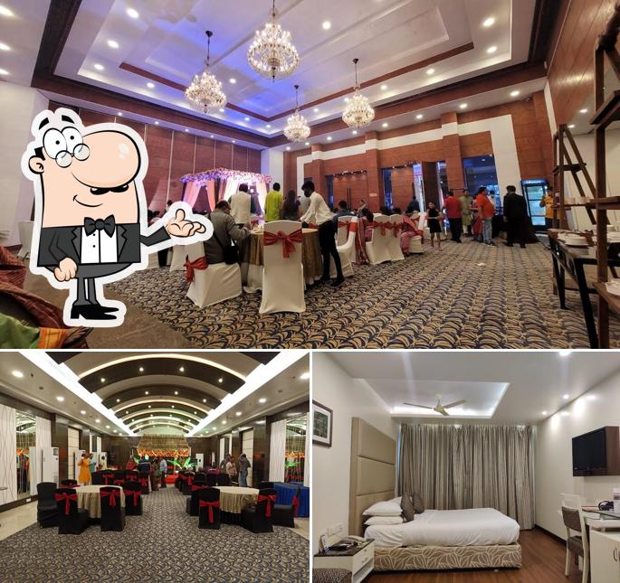 Take a seat at one of the tables at Hotel Hindusthan International Bhubaneswar