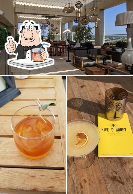 The picture of drink and interior at Hive and Honey Rooftop Bar