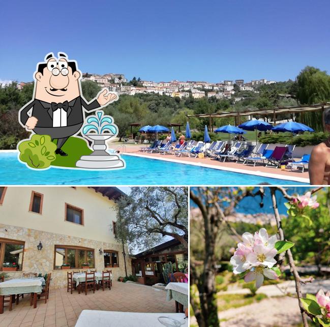Puoi goderti l'aria fresca da seduto all'esterno di Agriturismo Valle degli Ulivi