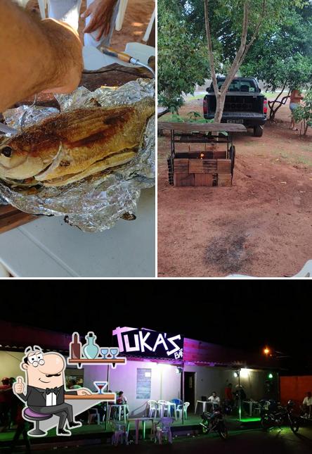 The image of Tuka's Bar’s interior and food