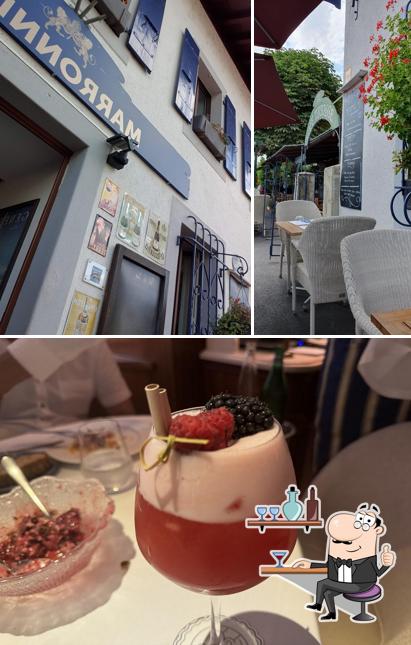 Dai un’occhiata alla foto che mostra la interni e bevanda di Restaurant 'Café des Marronniers'