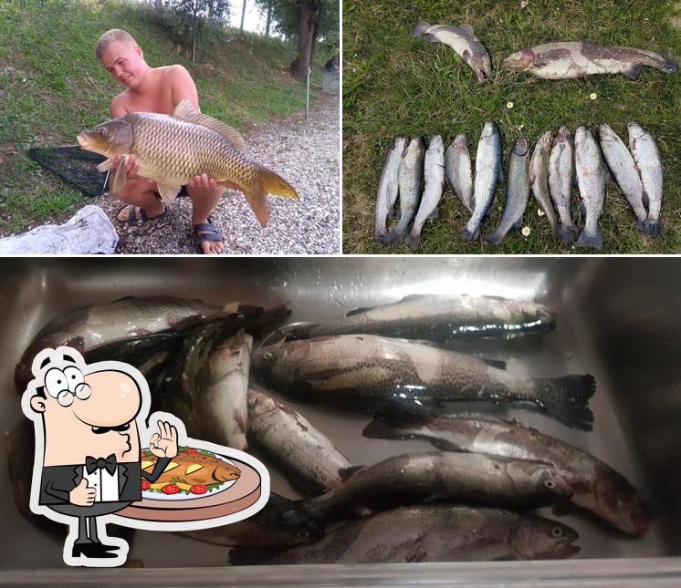 Prenditi un pasto a base di pesce a Pesca Sportiva Laghetto ulivi Di Fontana Gabriele