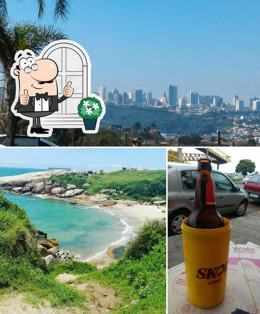 Confira a imagem mostrando exterior e cerveja a Lanchonete Santa Paula