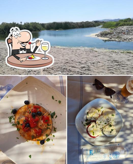 Guarda la foto che mostra la cibo e esterno di Zefiro Beach