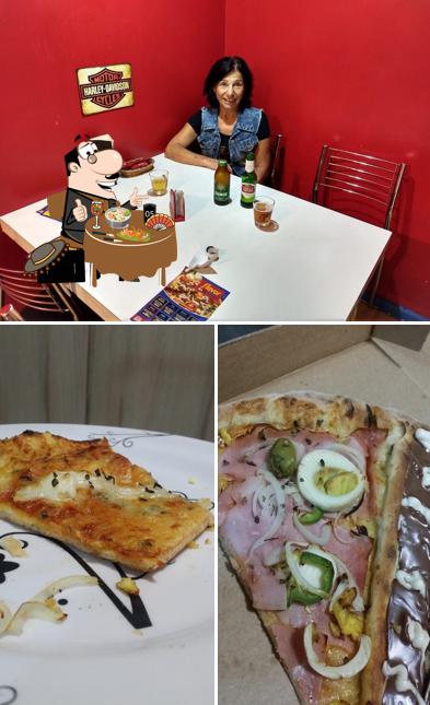 Entre diferentes coisas, comida e mesa de jantar podem ser encontrados a Flavor Pizza