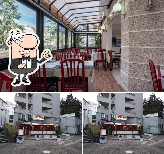 Take a look at the image depicting exterior and interior at Pizzeria Sainte Marie