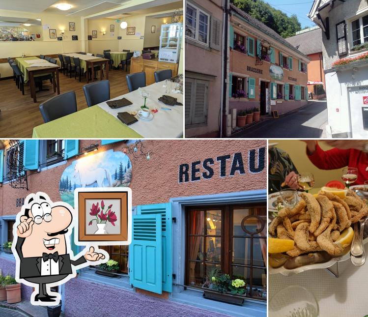 Installez-vous à l'une des tables de Restaurant Au Cheval Blanc