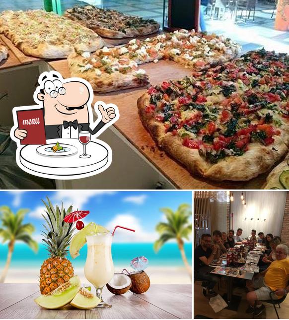 Tra le diverse cose da Mac che pizza! Cilavegna si possono trovare la cibo e tavolo da pranzo