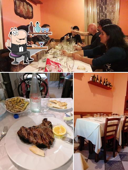 La foto della interni e tavolo da pranzo di Ristorante e Pizzeria I Tre Angeli