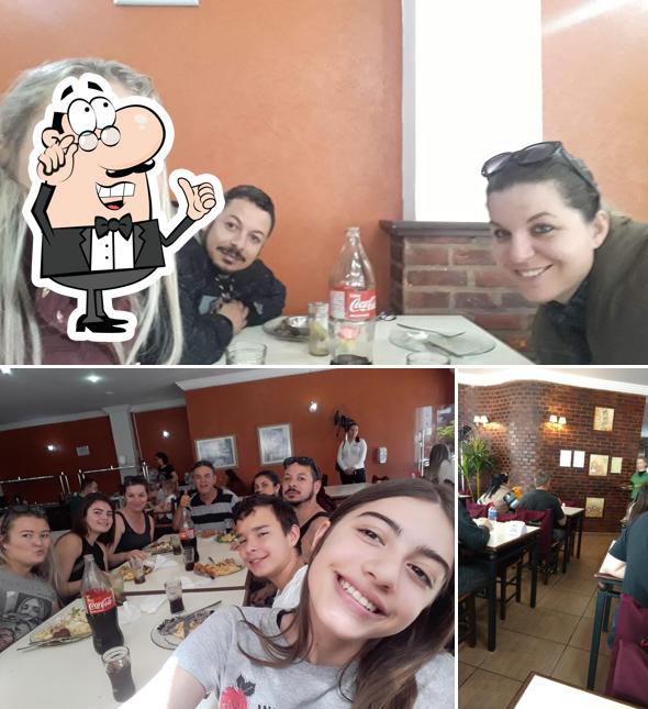 Sente em uma das mesas no Restaurante Fratelli