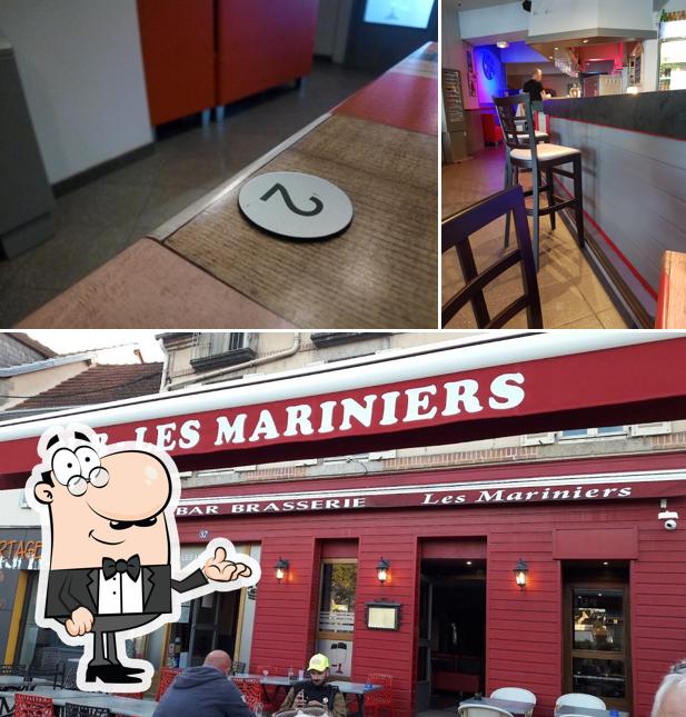 Installez-vous à l'une des tables de Pub Brasserie Les Mariniers