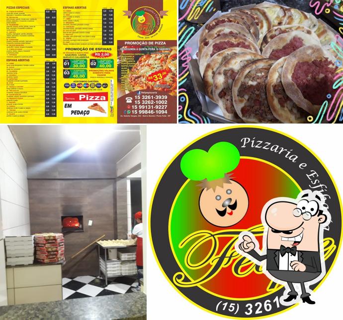 O interior do Pizzaria & Esfiharia Felipe