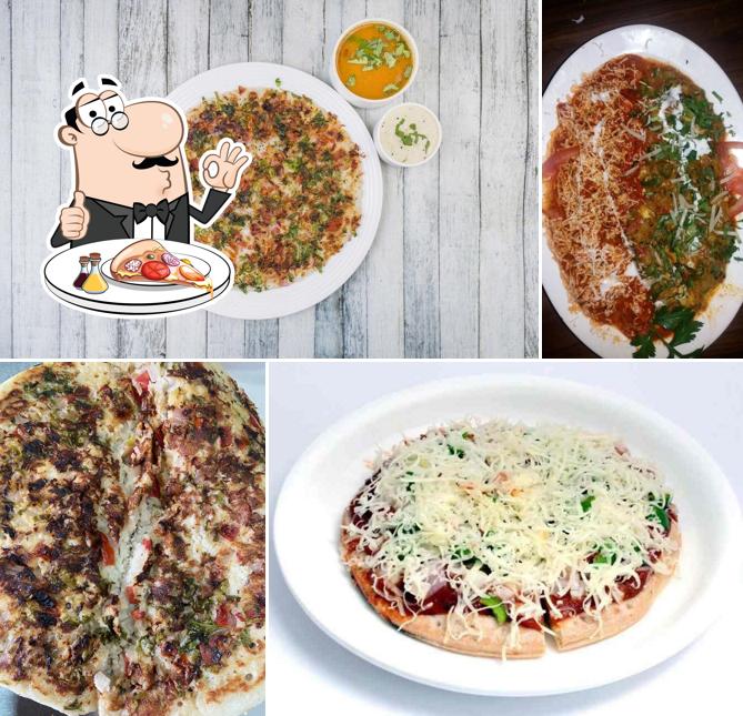 Pick pizza at Shivam Snacks