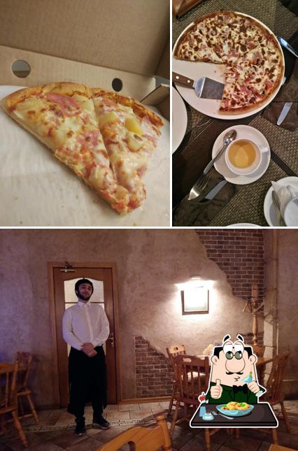 Фото, на котором видны еда и столики в Сити Пицца