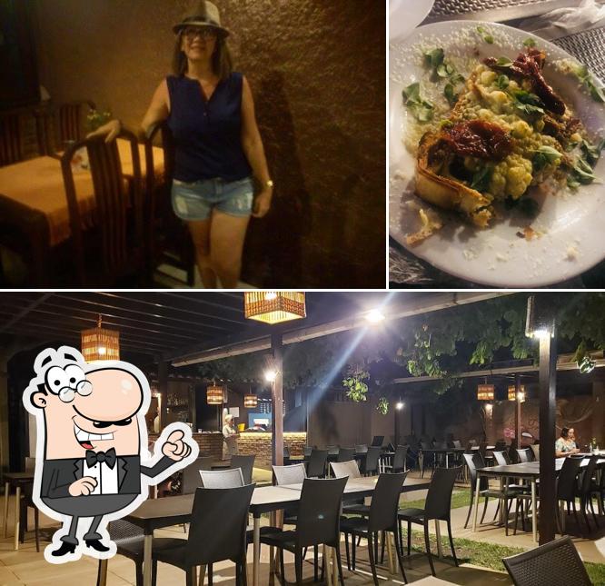 Entre diferentes coisas, interior e comida podem ser encontrados a Fornaria Pizzaria