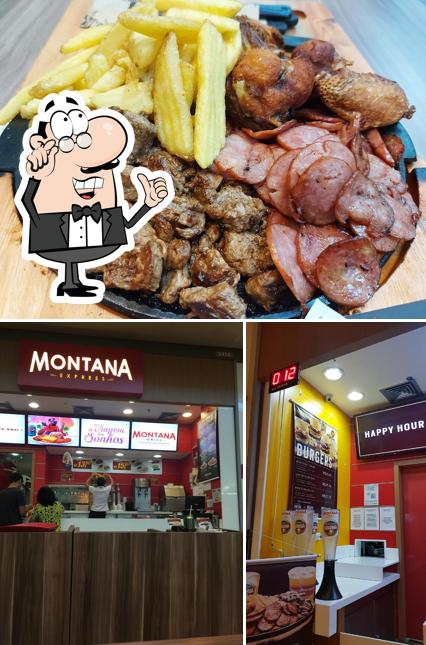 A imagem do Montana Grill Express’s interior e eu no