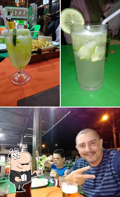 Desfrute de um drinque no Pizzaria Oliveira