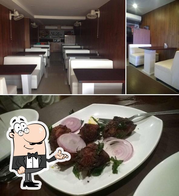 The picture of interior and meat at Al Zain