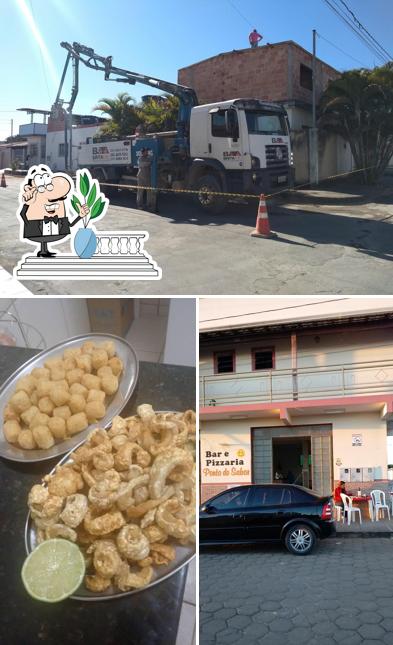 O Bar Pizzaria Ponto Do Sabor se destaca pelo exterior e comida