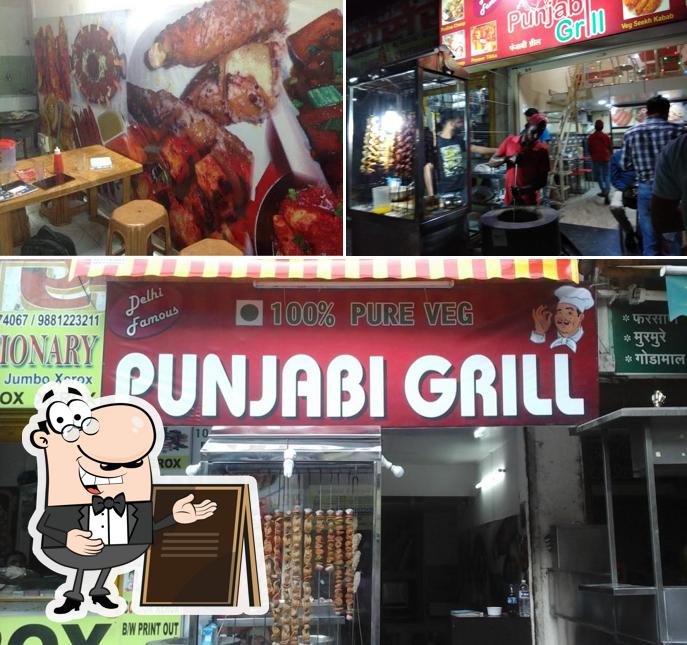 The image of Punjabi Grill’s exterior and dining table