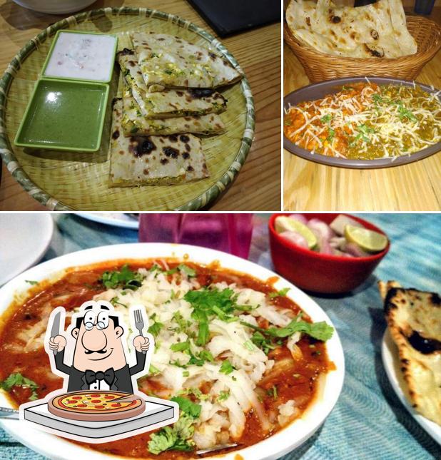 Get pizza at Chilli Spice Resto