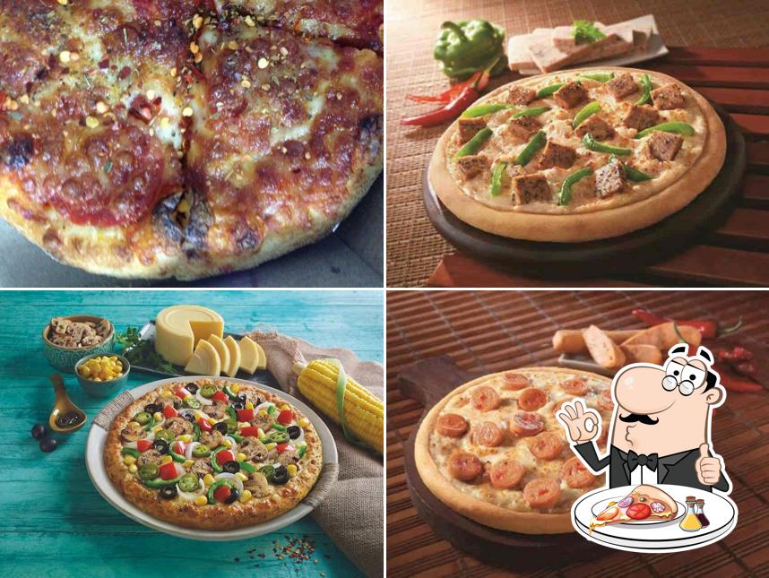 At Domino's Pizza, you can try pizza