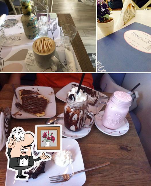 La interni e tavolo da pranzo del ristorante