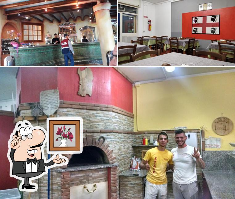 Siediti a un tavolo di Pizzeria Buongustaio
