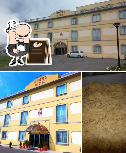 La immagine della esterno e cibo di Hotel Rizzi