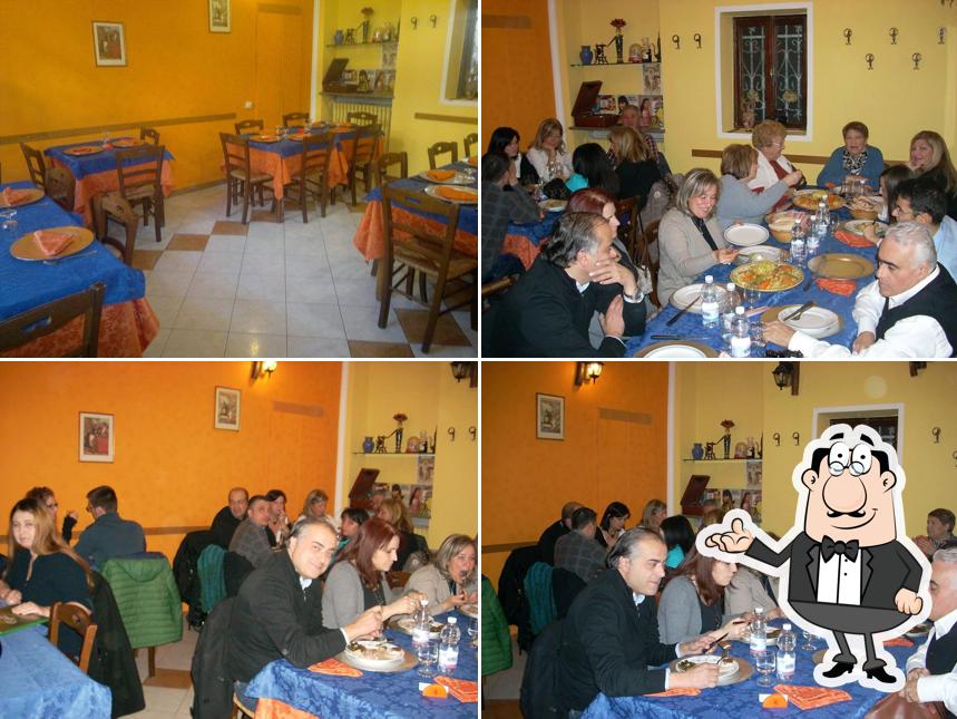 La foto della interni e tavolo da pranzo di Il Dattero