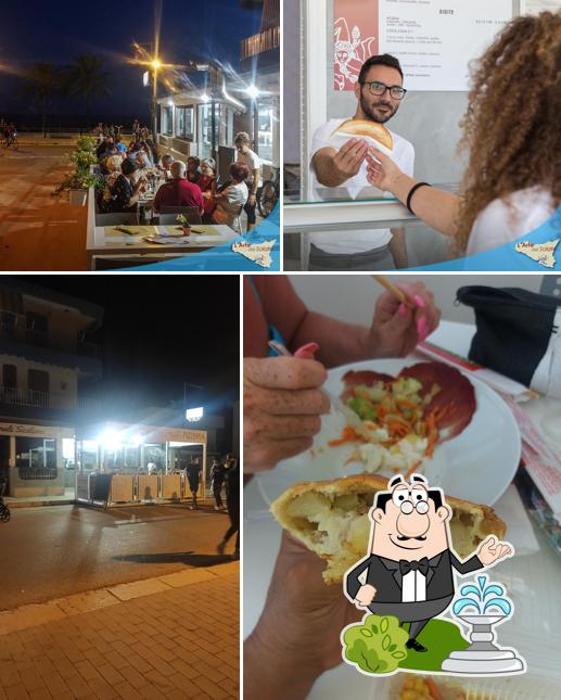 Goditi la vista dagli esterni di L'Arte del Salato - Pizzeria vista mare