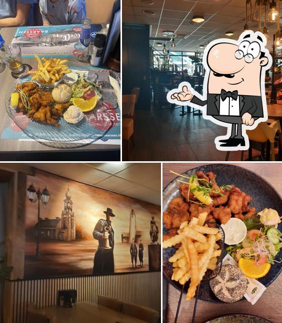 Installez-vous à l'une des tables de Visspecialiteiten en Restaurant Baarssen