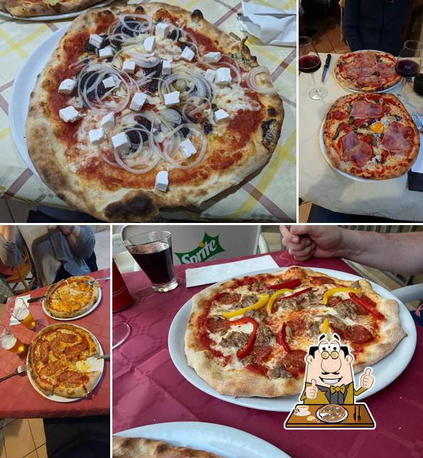 A Pizzeria La Taverna, puoi assaggiare una bella pizza