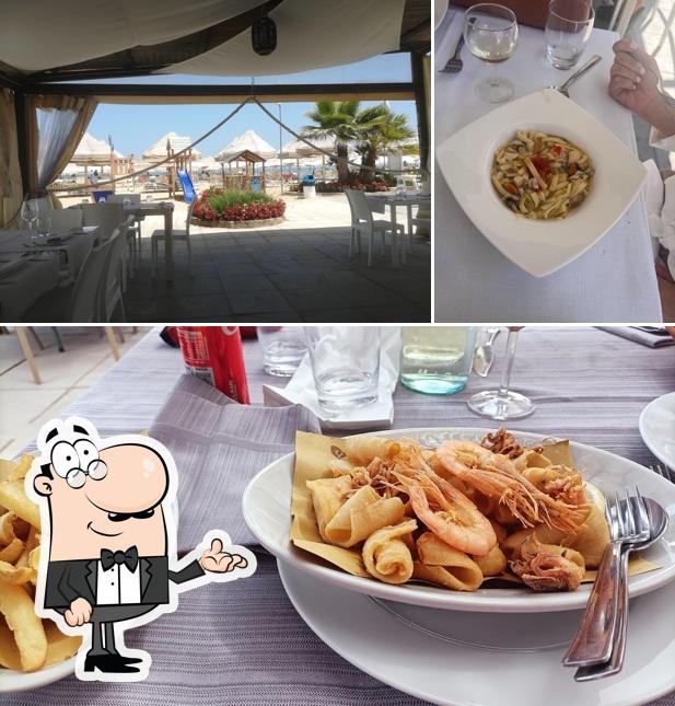 Dai un’occhiata alla immagine che raffigura la interni e bevanda di Ristorantino Lido Riccio