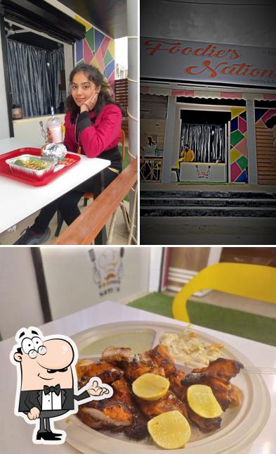 The picture of interior and beverage at Foodie's Nation