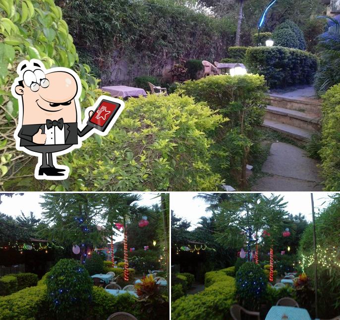 The exterior of Garland's Garden Bar