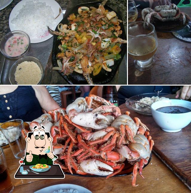 Esta é a foto mostrando comida e cerveja no Caranguejo do Gatinho