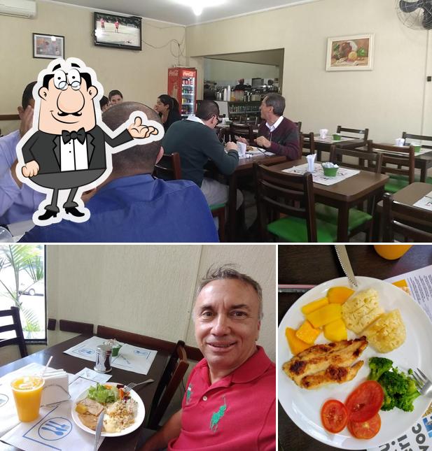 Dê uma olhada a ilustração ilustrando interior e comida a Restaurante Grande Família