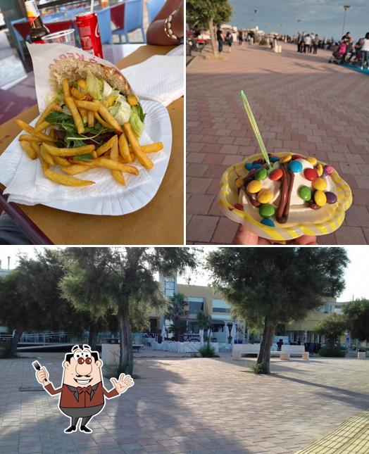Guarda la foto che presenta la cibo e esterno di Caroli Food