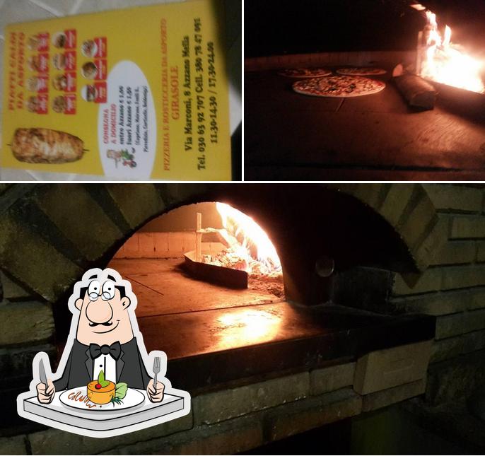 La foto di cibo e interni da Pizzeria Girasole - Azzanomella