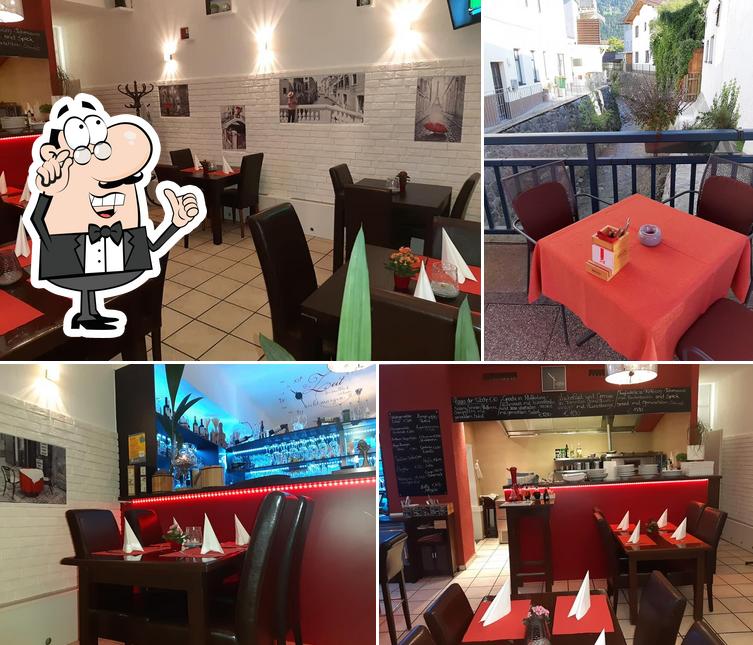 Installez-vous à l'une des tables de Pizzeria Don Peppe