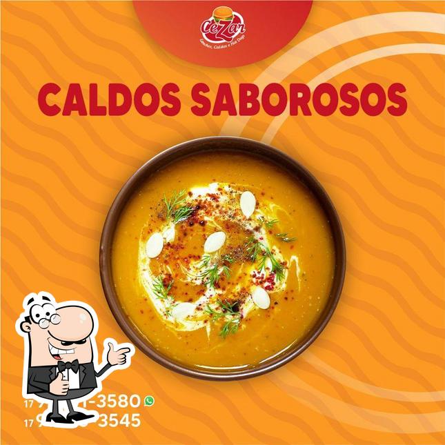 Look at the picture of Cezar Lanche-Caldo-Hotdog
