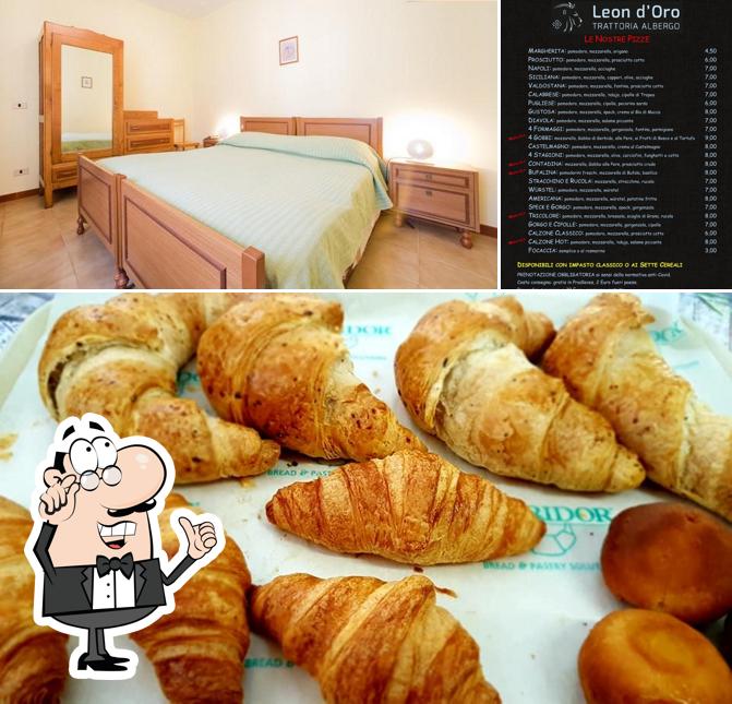 La immagine della interni e cibo di Trattoria Leon d'Oro