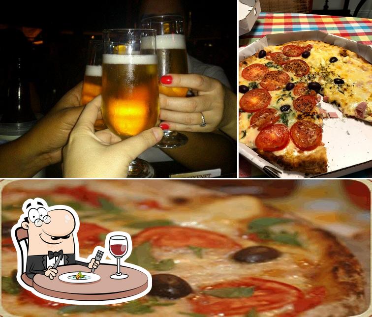 Esta é a imagem mostrando comida e cerveja a Da Vinci Pizzaria