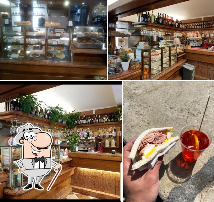 Questa è la immagine che presenta la esterno e cibo di Bar ae Maraveje