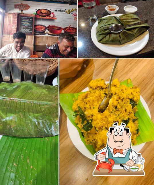 Order various seafood dishes served at Erivum Puliyum