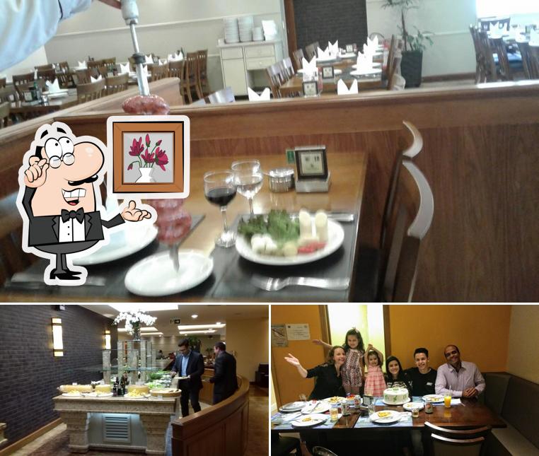 Veja imagens do interior do Pizzaria Jardim do Lago