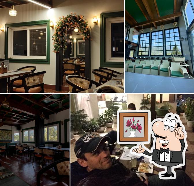 The interior of Green Italian Cafe & Restaurant (Green Hotel Rooftop)