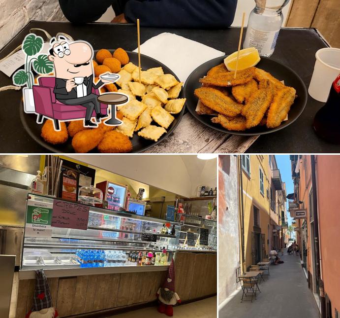 Questa è la immagine che presenta la interni e esterno di Fritto & mangiato